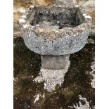 A BOWED STONE SINK 69 x 61 x 23cms. VIEWING FOR THIS ITEM IS BY APPOINTMENT ONLY, AND IS NOT AT JS