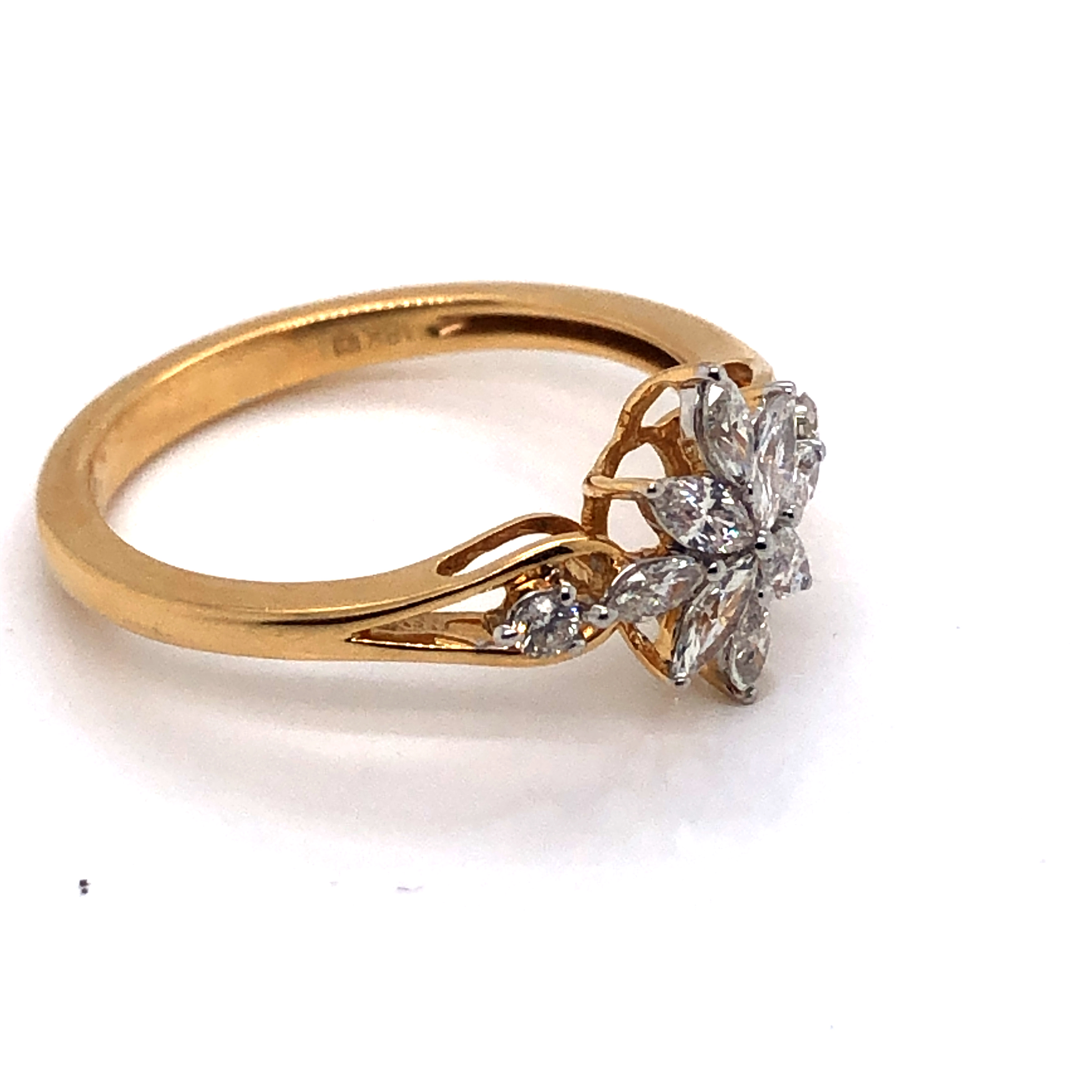 A DIAMOND FLORAL CLUSTER RING. THE FLORAL DESIGN CONSISTING OF EIGHT MARQUISE CUT DIAMONDS WITH - Image 2 of 3