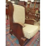 AN INTERESTING EARLY 20th C. OAK ARTS AND CRAFTS DESIGN ARMCHAIR. H 104. W 68cms