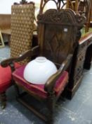 A LATE 17th C. OAK WAINSCOT CHAIR, THE BACK PANEL CARVED WITH PAIRS OF ROUNDELS AT THE POINTS OF A