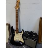 SQUIRE STRATOCASTER ELECTRIC GUITAR AND FENDER FRONTMAN 15R AMP