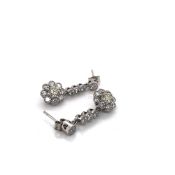 A PAIR OF PLATINUM AND MULTI DIAMOND ARTICULATING DROP EARRINGS. UNHALLMARKED, THE STEM STAMPED PLAT