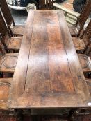 A 17th/18th C. OAK REFECTORY TABLE, THE REMOVABLE TOP ON BALUSTER TURNED LEGS JOINED BY STRETCHERS