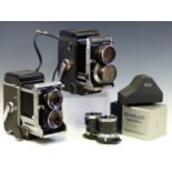 A MAMIYA C330 PROFESSIONAL F CAMERA, A SIMILAR MODEL C3, THREE LENS SETS AND OTHER ACCESSORIES