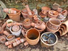 A LARGE COLLECTION OF VARIOUS TERRACOTTA PLANTERS, POTS ETC