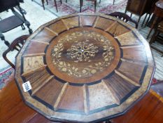 A 19th C. SPECIMEN WOOD TRIPOD TABLE WITH SIXTEEN PANELS RADIATING ABOUT THE CENTRAL FOLIATE