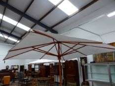 A VERY LARGE GOOD QUALITY COLONIAL SHADE GARDEN PARASOL 3.75M SQUARE.