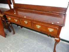 AN 18th C. AND LATER OAK DRESSER, THE OPEN TWO SHELF BACK RECESSED ABOVE THE THREE DRAWER BASE ON