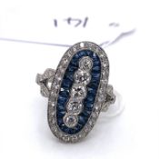 AN ART DECO STYLE PLATINUM, SAPPHIRE AND DIAMOND OVAL PANEL RING. THE FIVE VERTICAL CENTRAL OLD