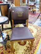 A LATE VICTORIAN OAK PUGINESQUE CHAIR TOGETHER WITH A LATER IRON FIRE SCREEN (2)