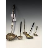 THREE HALLMARKED SILVER TODDY LADLES WITH WOODEN HANDLES, ANOTHER WITH A HORN HANDLE AND A FIFTH