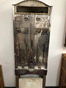 AN EMBASSY AND NUMBER 6 CHROME FRONTED CIGARETTE DISPENSER, TWO RACKS DISPENSING AT 10P AND TWO AT