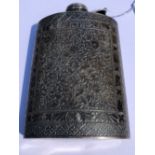 A CONTINENTAL SILVER NIELLO TYPE DECORATED HIP FLASK WITH SCREW DOWN HINGED COVER. HEIGHT