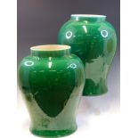 A PAIR OF CHINESE BALUSTER JARS EVENLY COVERED IN A FINELY CRACKLED GREEN GLAZE, SIX AND FOUR