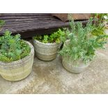 FIVE SIMILAR COMPOSITE GARDEN PLANTERS