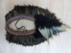 A MID 20th C. MASAI TRIBE WARRIORS FUR AND FEATHER BEADED LEATHER HEADDRESS TOGETHER WITH A SPEAR
