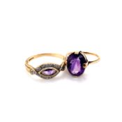 A 9ct HALLMARKED GOLD AMETHYST AND DIAMOND DRESS RING, TOGETHER WITH AN OVAL CUT SINGLE STONE FOUR