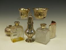 A VICTORIAN SILVER CREAM AND SUGAR, A SILVER CASTER, A CASED SET OF ENAMELLED SILVER COFFEE