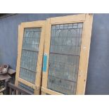 SIX MATCHING PAINTED ART DECO DOORS WITH INSET BRONZE FRAMED GLAZING FOR RESTORATION.