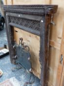 A 19th C. ANGLO-INDIAN HARDWOOD FIRE SURROUND CARVED WITH FOLIAGE BANDS, THE TOP WITH A ROW OF