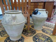 A PAIR OF TERRACOTTA OIL JARS