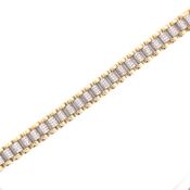 A 9ct HALLMARKED GOLD PRESIDENT STYLE CZ SET BRACELET.