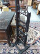 AN UNUSUAL ANTIQUE CARVED FOLK ART YARN WINDER TRESTLE BASE H 170cms