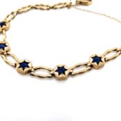 A VINTAGE LAPIS LAZULI LINKED BRACELET, COMPLETE WITH ATTACHED SAFETY CHAIN. UNHALLMARKED,