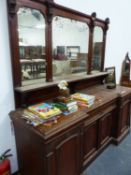 A VICTORIAN MIRROR BACKED MAHOGANY SIDEBOARD, THE CENTRAL DRAWER TO THE BASE RESEED FROM THE