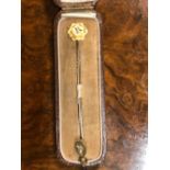 TWO DIFFERENT VICTORIAN 15ct GOLD AND DIAMOND STICK PINS OR TIE PINS, EACH SET WITH A SMALL