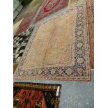 A MACHINE MADE CARPET OF PERSIAN DESIGN 316 x 273 cms