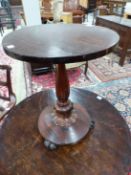 A 19th C. MAHOGANY WINE TABLE, THE CIRCULAR TOP ON A RIBBED BALUSTER COLUMN ENDING IN AN INVERTED