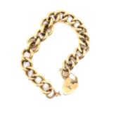 A 9ct HALLMARKED GOLD CHARM BRACELET COMPLETE WITH PADLOCK. GROSS WEIGHT 17.62grms.