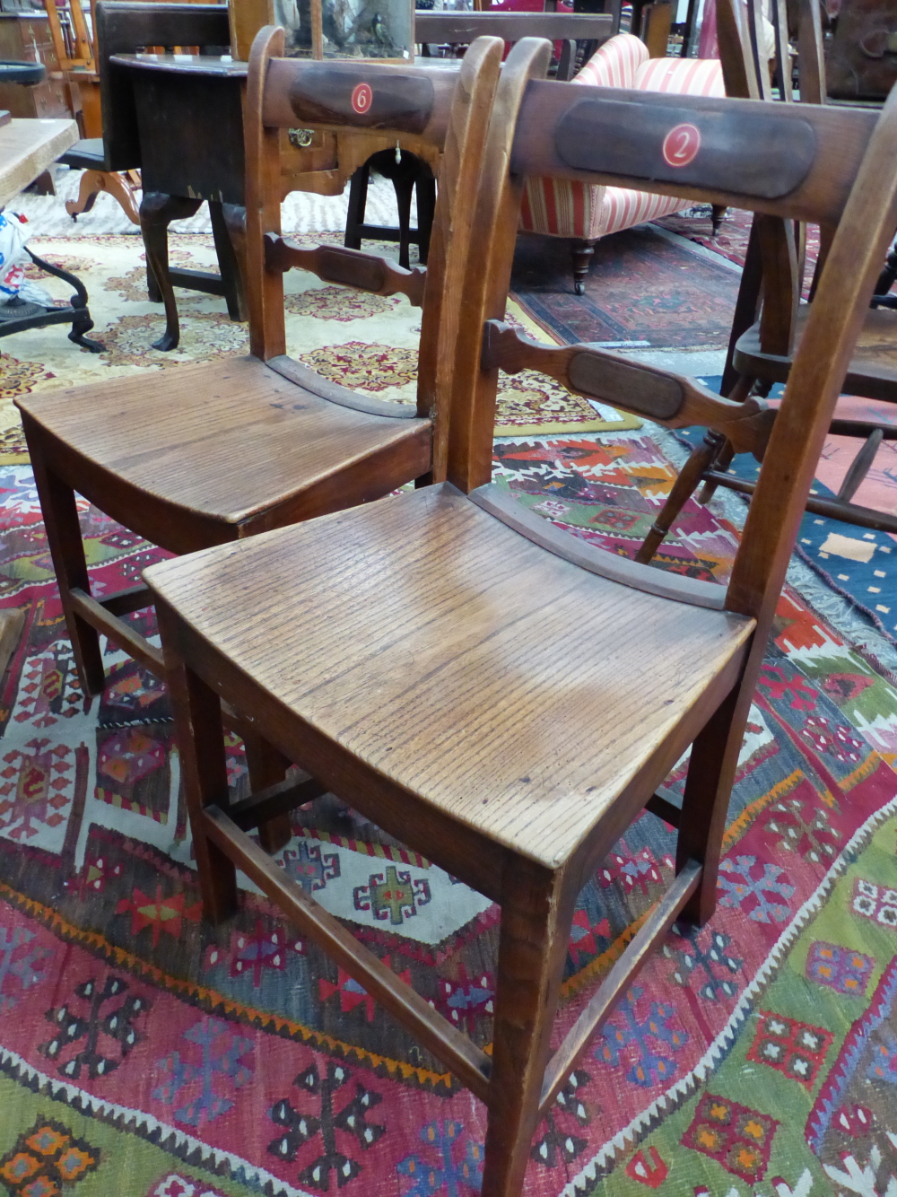 A SET OF SIX 19th. C. ELM CHAIRS, THE BAR BACKS AND TOP RAILS WITH ROSEWOOD BATONS, THE TOP RAILS - Image 7 of 7