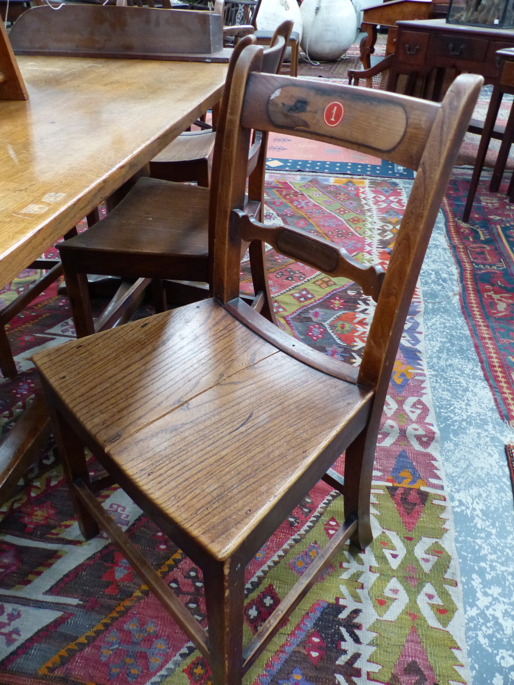 A SET OF SIX 19th. C. ELM CHAIRS, THE BAR BACKS AND TOP RAILS WITH ROSEWOOD BATONS, THE TOP RAILS - Image 6 of 7