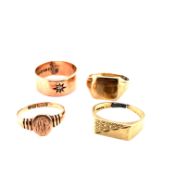 FOUR 9ct HALLMARKED GOLD SIGNET RINGS, INCLUDING ONE DIAMOND SET EXAMPLE. GROSS WEIGHT 15.56grms.
