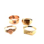 FOUR 9ct HALLMARKED GOLD SIGNET RINGS, INCLUDING ONE DIAMOND SET EXAMPLE. GROSS WEIGHT 15.56grms.