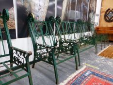 A PAINTED ARTS AND CRAFTS STYLE IRON BENCH WITH FOUR MATCHING ARM CHAIRS.