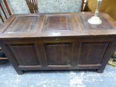 AN 18th C. OAK COFFER WITH THREE PANELLED LID AND FRONT. W 109 x D 47 x H 58cms.