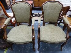 A PAIR OF 19th C. MAHOGANY SHOW FRAME ELBOW CHAIRS WITH UPHOLSTERED BACKS, SEATS AND ELBOW RESTS