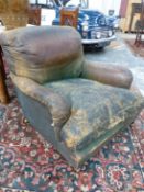 HOWARD AND SONS-AN EDWARDIAN GENTLEMAN'S LEATHER LIBRARY ARMCHAIR- WITH LABEL TO UNDERSIDE SHORT