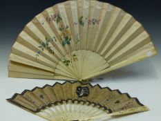 A 19th C. IVORY FAN, THE GUARD STICKS PIERCED AND CARVED WITH FLOWERS, THE PAPER LEAF PAINTED WITH A