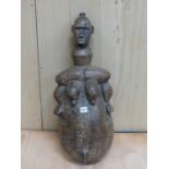 A LATE 19th/EARLY 20th C. MAHOGANY HERMAPHRODITIC FIGURE, PROBABLY CAMEROON, THE NAKED FORM WITH