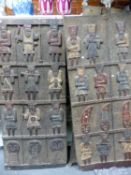 A PAIR OF LATE 19th C. MAHOGANY GRANARY DOORS, PROBABLY CAMEROON, EACH CARVED IN RELIEF AND COLOUR