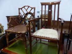 AN EDWARDIAN STAINED WOOD ELBOW CHAIR TOGETHER WITH A CANE ELBOW CHAIR