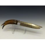 A PAIR OF MALAYSIAN SINGLE EDGED SWORDS WITH BRASS MOUNTED EBONY HANDLES. 71cms. TOGETHER WITH A