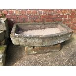 A BOWED STONE SINK. 108 x 63 x 21cms. VIEWING FOR THIS ITEM IS BY APPOINTMENT ONLY, AND IS NOT AT JS