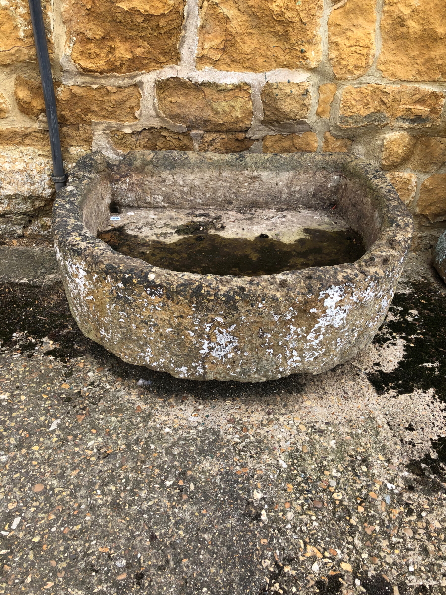 A LARGE BOWED STONE SINK. 86 x 97 x 28cms, VIEWING FOR THIS ITEM IS BY APPOINTMENT ONLY, AND IS