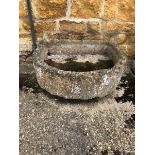 A LARGE BOWED STONE SINK. 86 x 97 x 28cms, VIEWING FOR THIS ITEM IS BY APPOINTMENT ONLY, AND IS