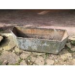 A CAST IRON CANTED TROUGH W 120 D 41 H 38. VIEWING FOR THIS ITEM IS BY APPOINTMENT ONLY, AND IS